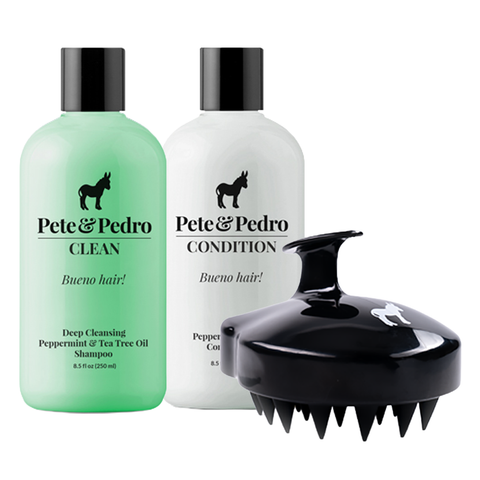 Two bottles of Pete & Pedro hair care products and a scalp massager on a white background
