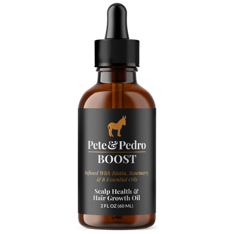 An amber glass dropper bottle of Pete & Pedro Boost Scalp Health & Hair Growth Oil on a solid white background.